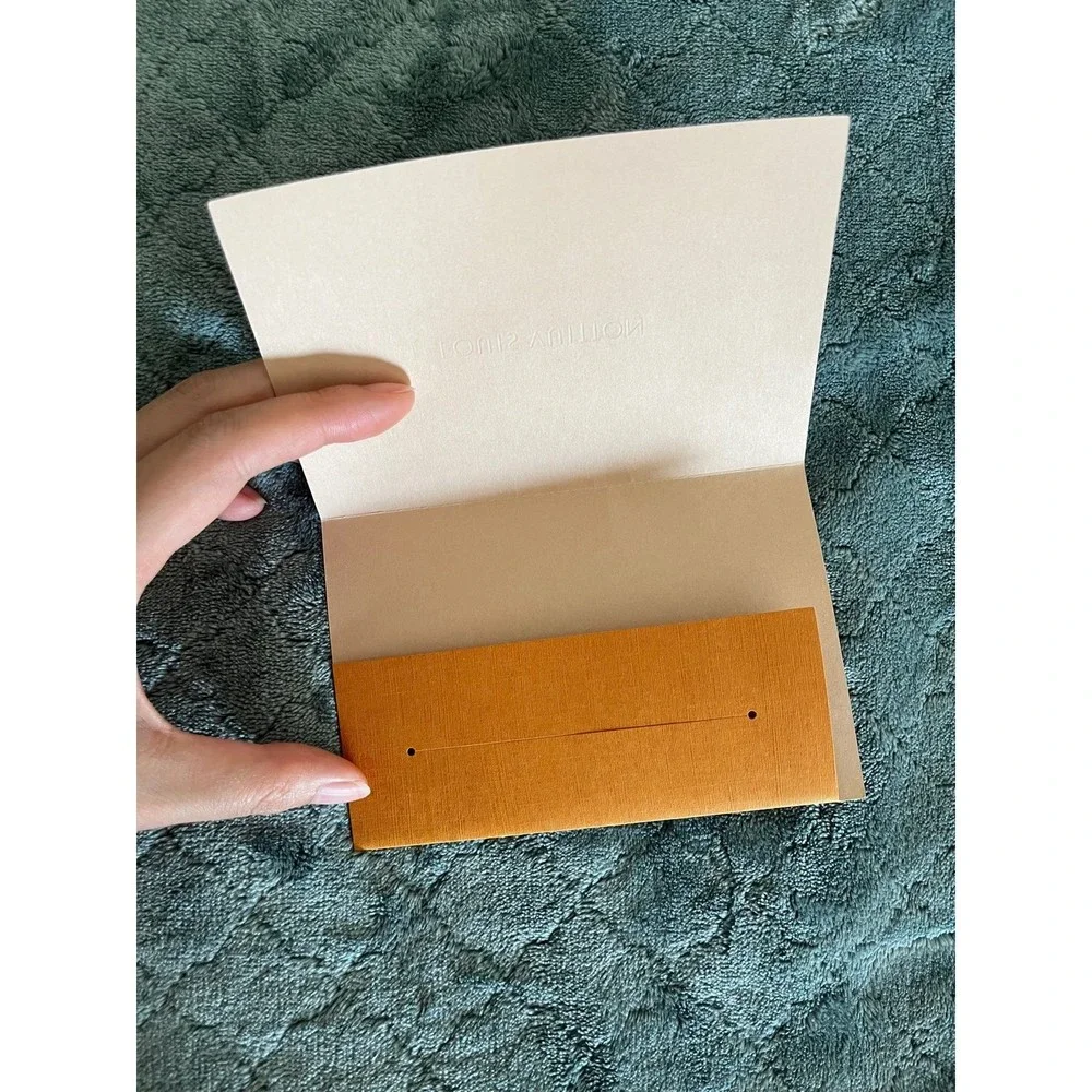 Louis‎ Vuitton receipt holder
